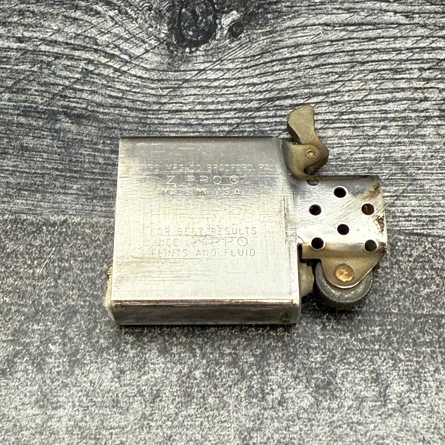 1979 Zippo Lighter - R.T. Jones Lumber - Brushed Chrome