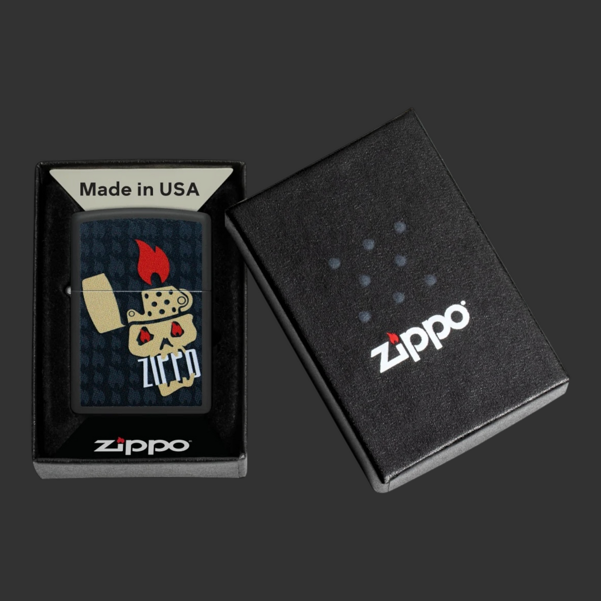 Black Matte Skull and Flames Zippo lighter with grinning skull and surrounding Zippo flame icons in original box.