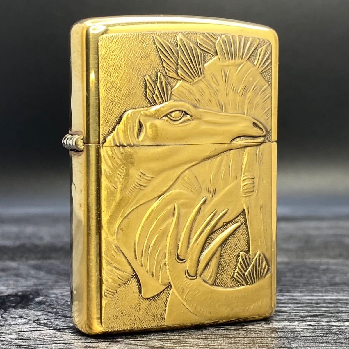 1993 Zippo Lighter - Stegosaurus - Barrett Smythe - High Polish Brass - Riley&#39;s 66 LLC