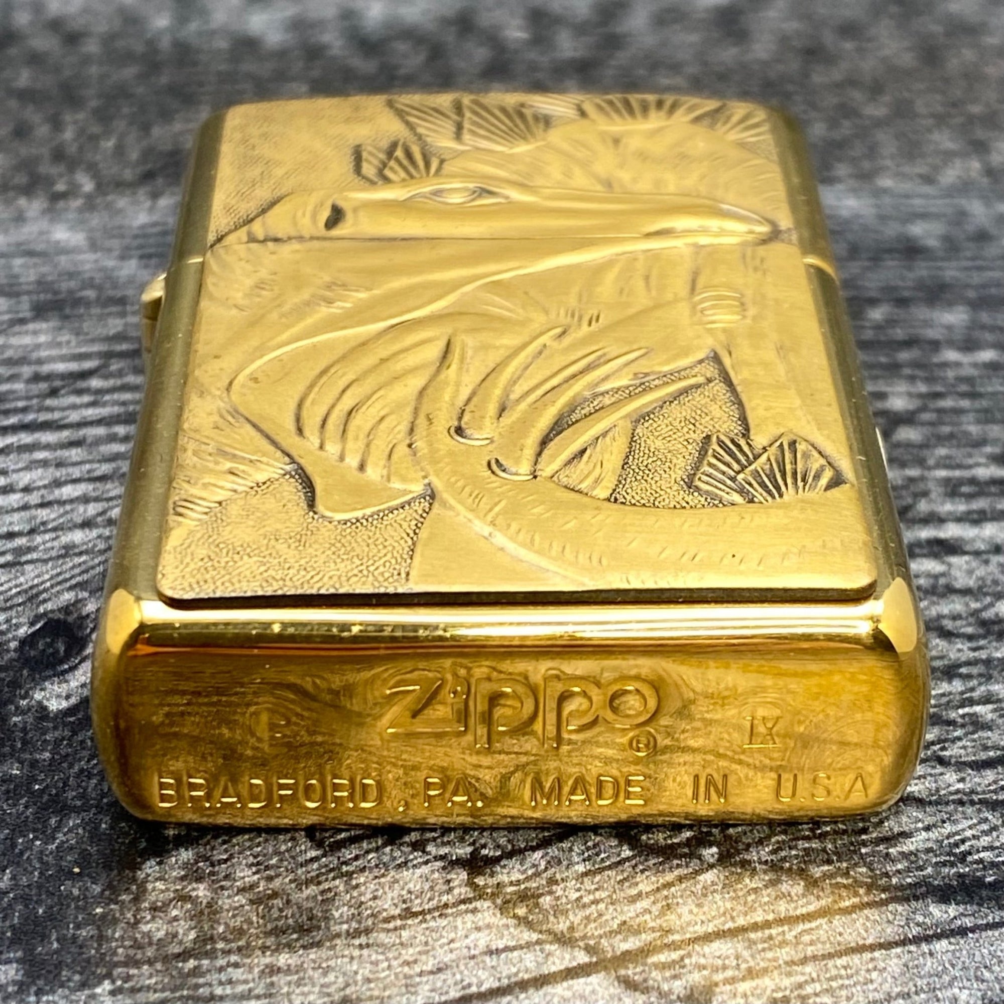 1993 Zippo Lighter - Stegosaurus - Barrett Smythe - High Polish Brass - Riley's 66 LLC