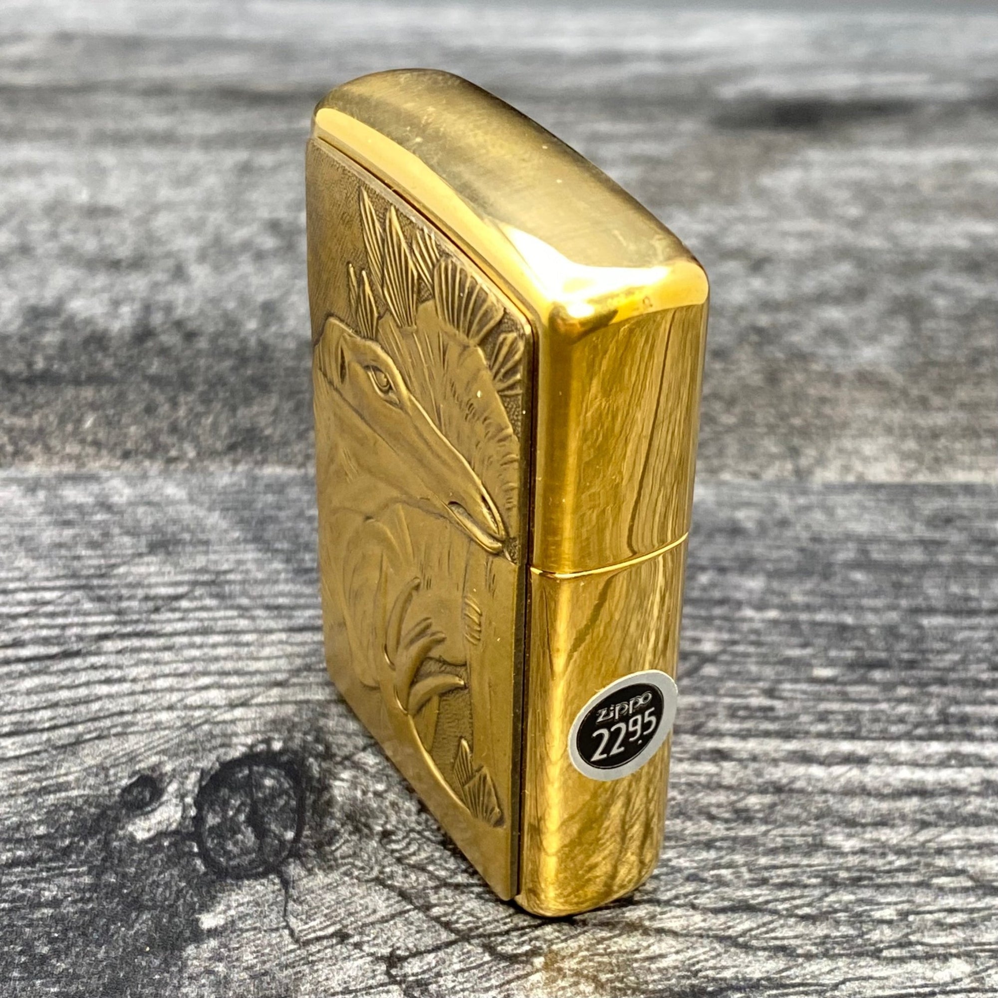 1993 Zippo Lighter - Stegosaurus - Barrett Smythe - High Polish Brass - Riley's 66 LLC