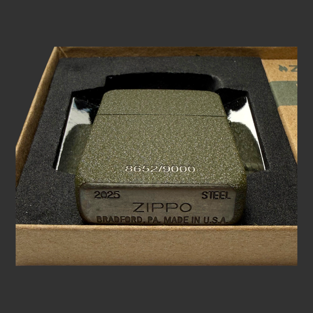 2025 Zippo 80th Anniversary WWII Victory lighter – bottom stamp showing olive green textured steel case detail