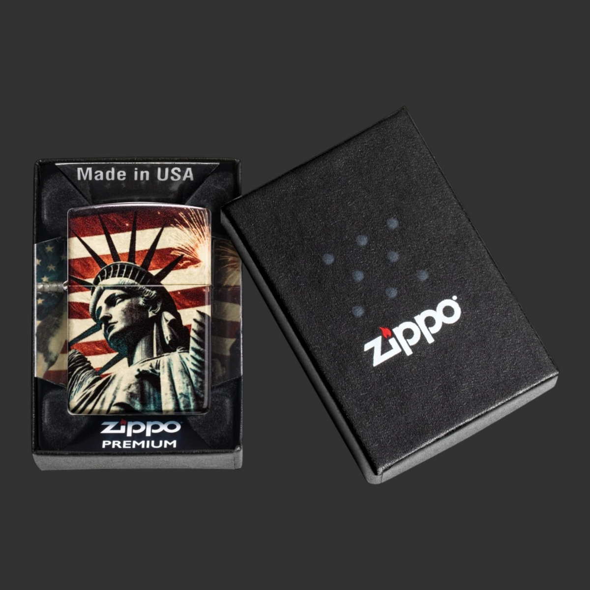 Tumbled Brass Spark of Liberty Zippo lighter with Statue of Liberty, American flag and fireworks design in original box.