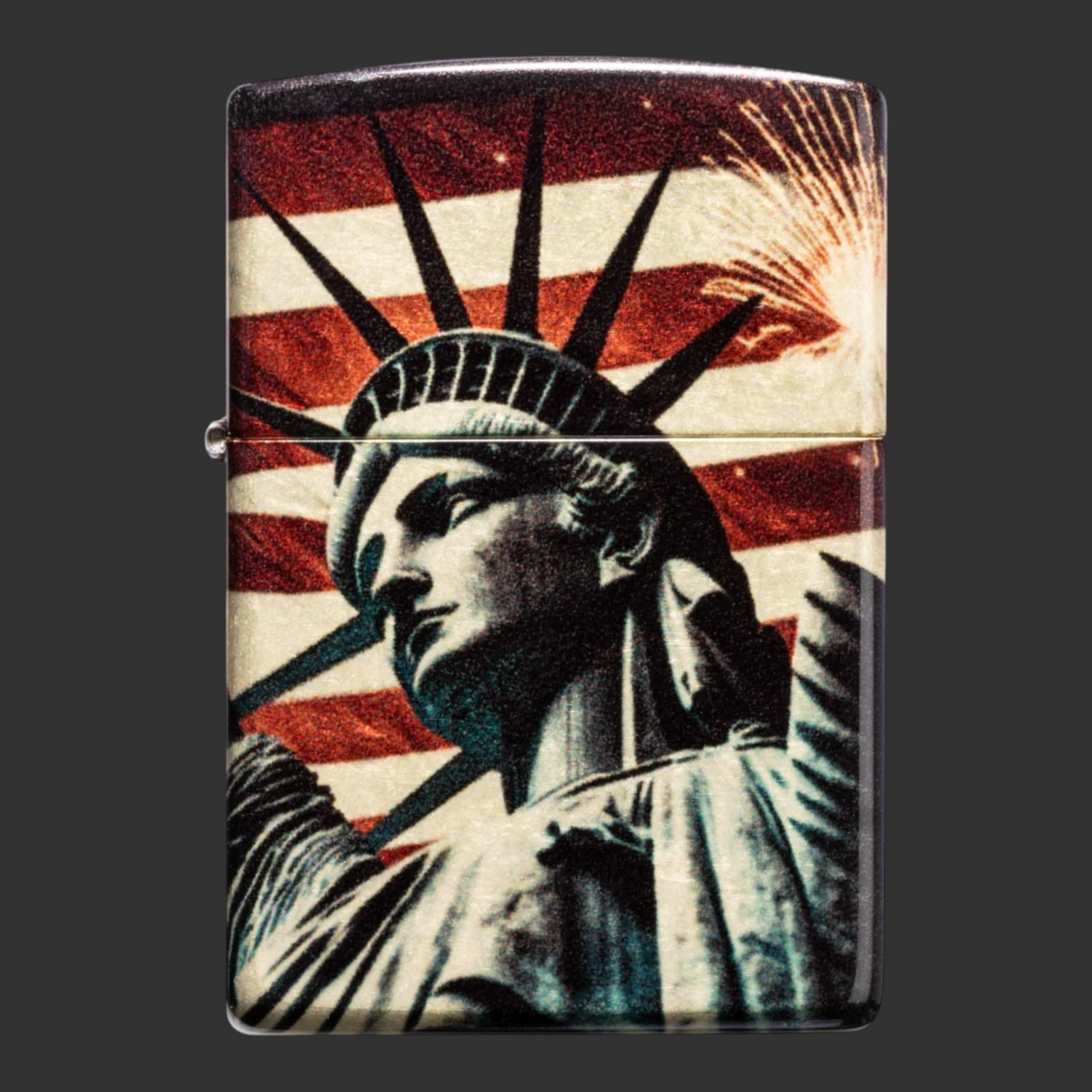 Tumbled Brass Spark of Liberty Zippo lighter with Statue of Liberty, American flag and fireworks design.