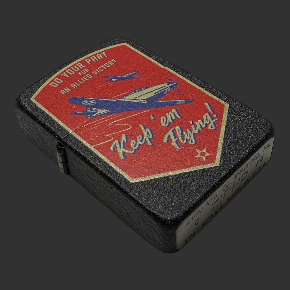 Angled top view of Riley's 66 Keep 'Em Flying Black Crackle 1941 Replica Custom Zippo showing the textured crackle finish and full artwork detail