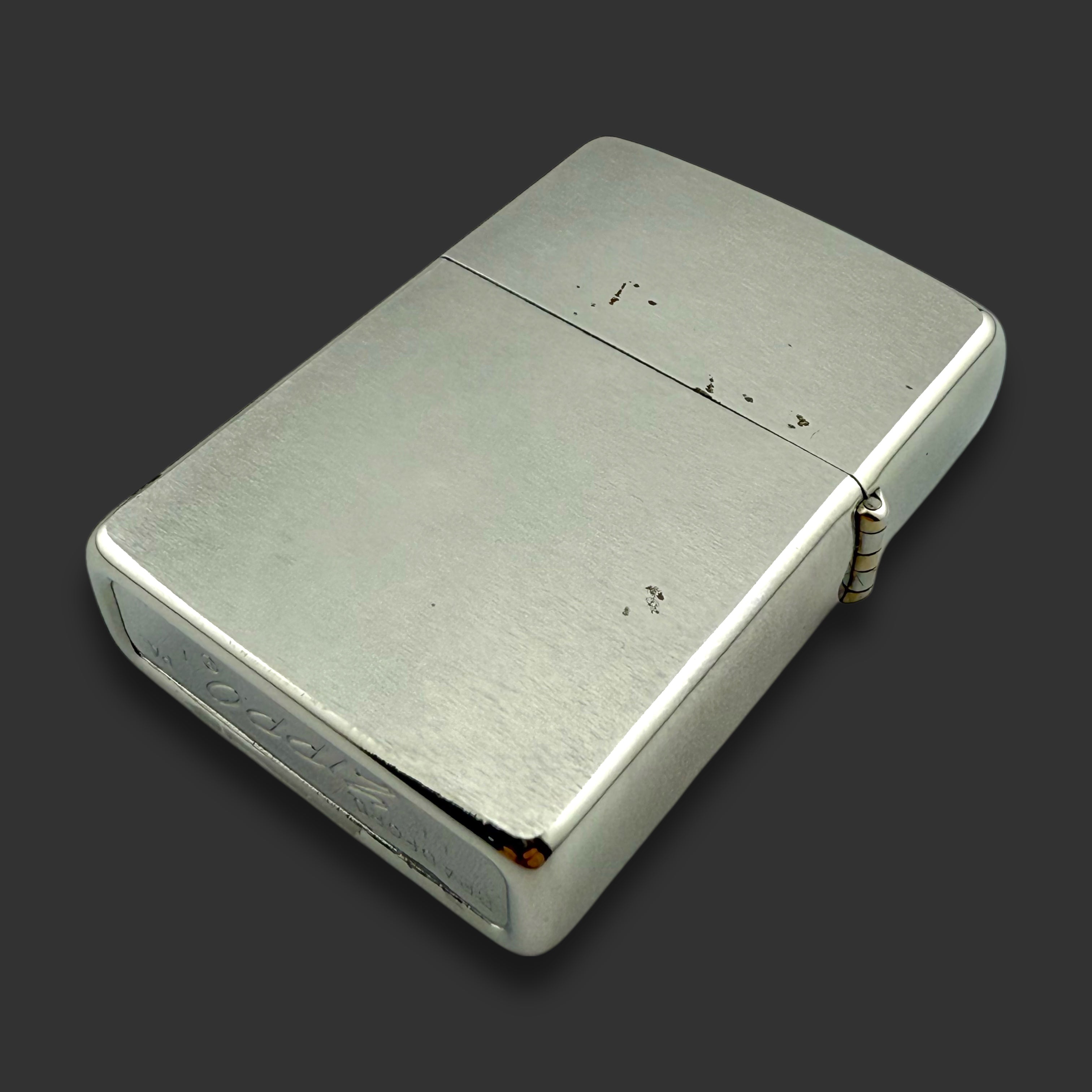 1971 Zippo Lighter - Reynolds Body Co - Brushed Chrome